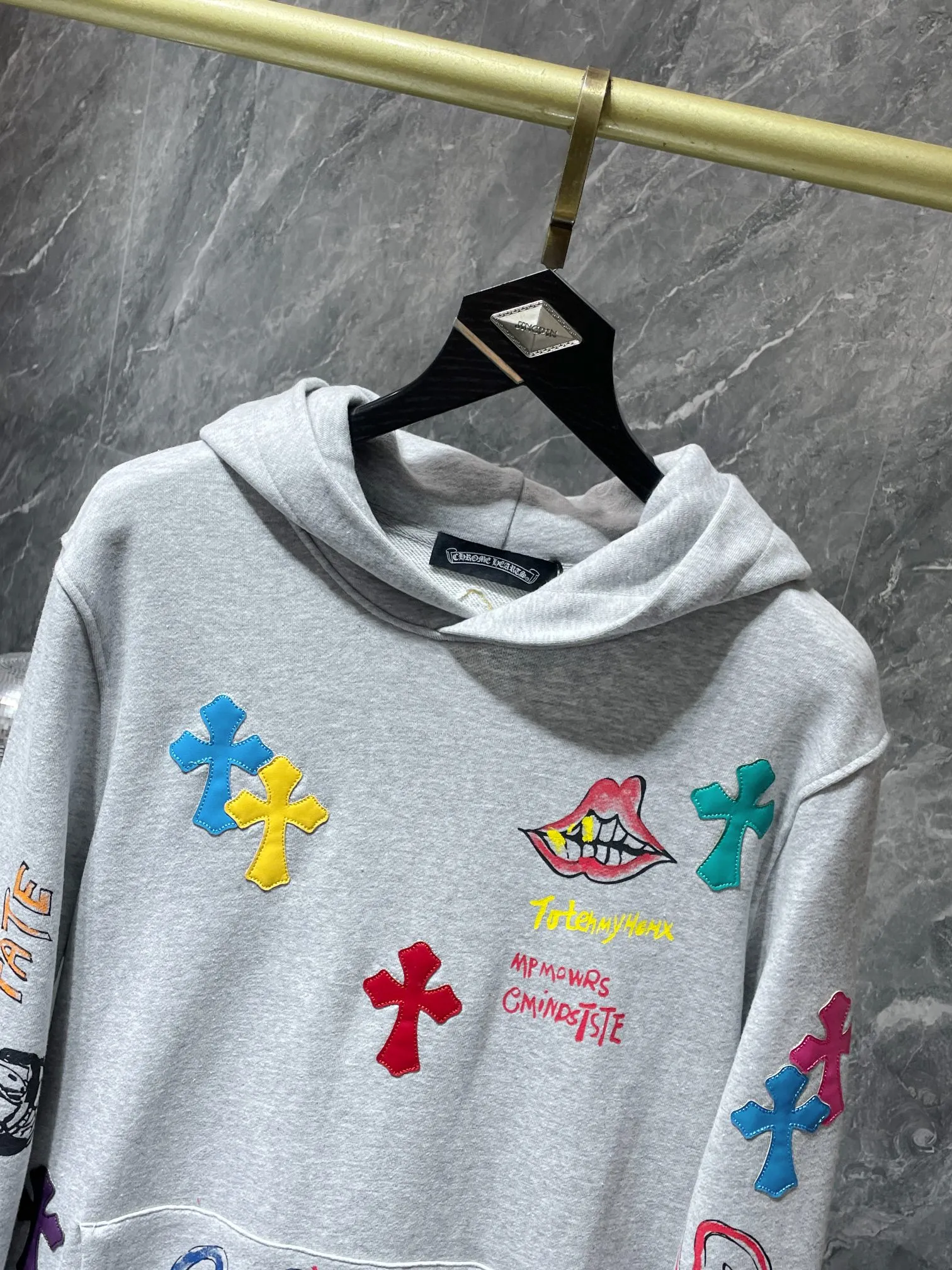 P276 Chrome Hearts Autumn and Winter 2025 Counter Synchronization Colorful cross leather Sanskrit hand-painted graffiti hooded sweatshirt Ins celebrity couple must-have, same style for men and women! The highest version! ! Imported leather! ! A must-have for internet celebrities! Recommended colors: white, black, gray Code numbers: S, M, L, XL